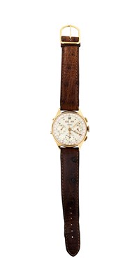 Lot 310 - EBERHARD & CO., DATO-COMPAX: TRIPLE CALENDAR CHRONOGRAPH GOLD WRISTWATCH, CIRCA 1955