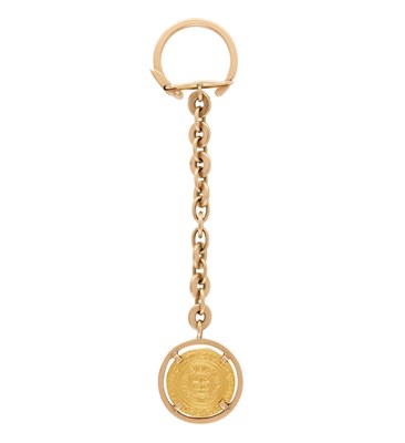Lot 18 - FATIMID GOLD DINAR COIN SET IN AN EGYPTIAN KEYRING, CAIRO, CIRCA 1960
