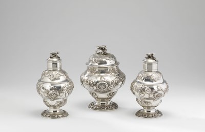 Lot 50 - A SET OF THREE GEORGE III SILVER TEA CADDIES