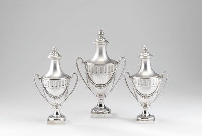 Lot 53 - A SET OF THREE GEORGE III SILVER SUGAR VASES AND COVERS