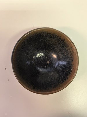 Lot 61 - A CHINESE JIANYAO HARE'S FUR TEA BOWL, SONG DYNASTY (960-1279)