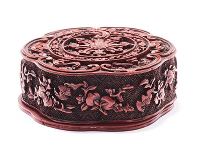 Lot 76 - A CHINESE CINNABAR LACQUER LOBED BOX AND COVER