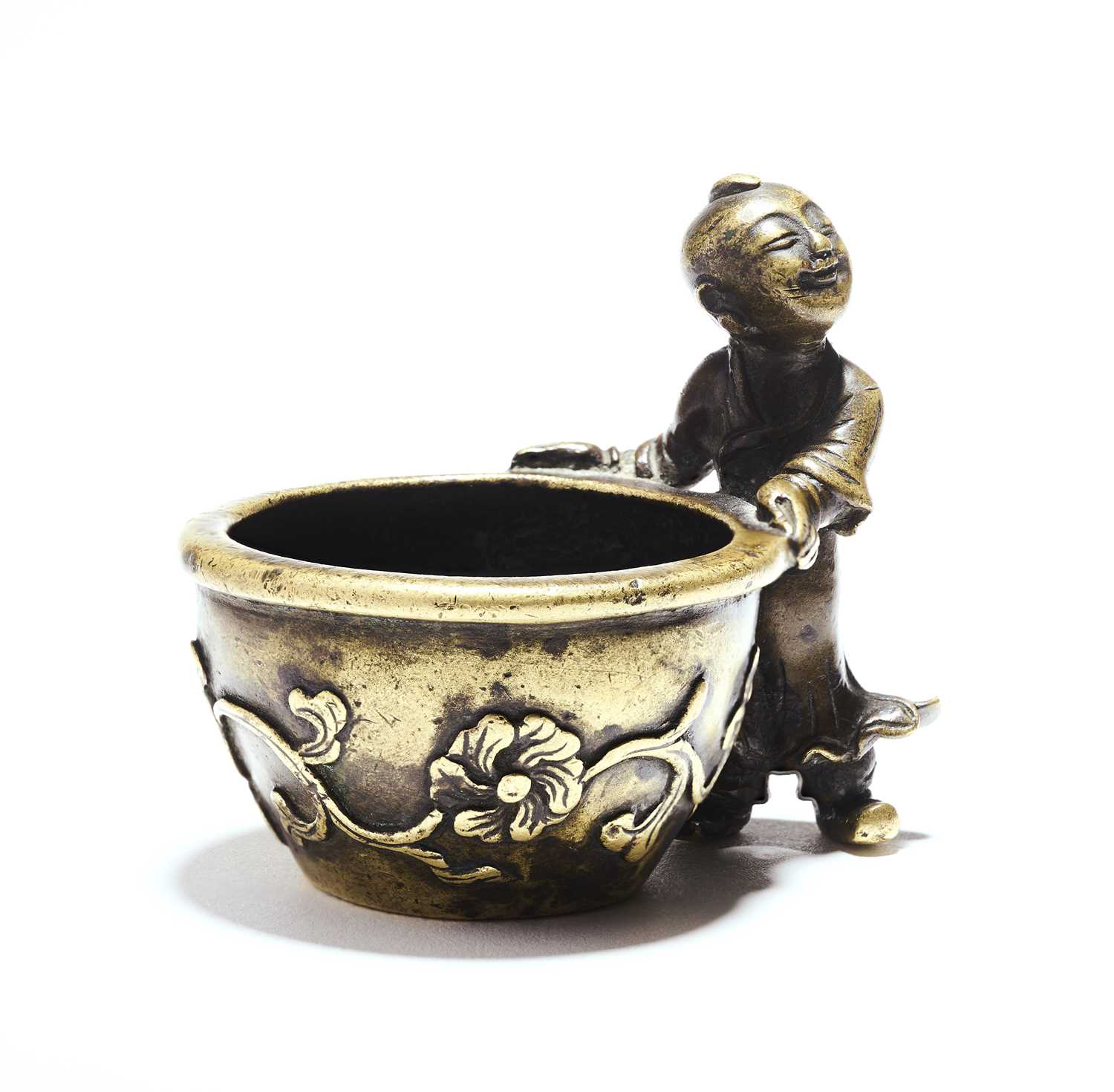 Lot 30 - A CHINESE BRONZE INCENSE BURNER IN THE FORM OF A BOY AND JARDINIERE, MING DYNASTY (1368-1643)