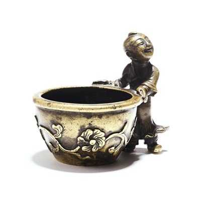 Lot 30 - A CHINESE BRONZE INCENSE BURNER IN THE FORM OF A BOY AND JARDINIERE, MING DYNASTY (1368-1643)