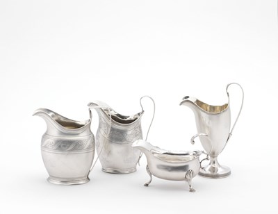 Lot 67 - A GEORGE III SILVER CREAM JUG