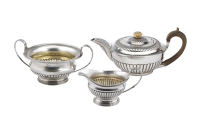 Lot 68 - A GEORGE III SILVER MATCHED THREE-PIECE TEA SET