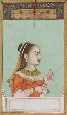 Lot 36 - A LADY IN EUROPEAN DRESS HOLDING AN FRUIT, MUGHAL, PROBABLY LUCKNOW, 18TH CENTURY