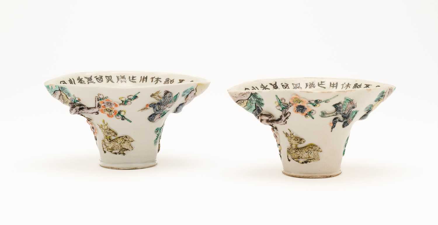Lot 55 - A PAIR OF FAMILLE-VERTE ENAMELLED LIBATION CUPS