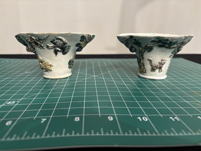 Lot 55 - A PAIR OF FAMILLE-VERTE ENAMELLED LIBATION CUPS