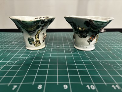 Lot 55 - A PAIR OF FAMILLE-VERTE ENAMELLED LIBATION CUPS