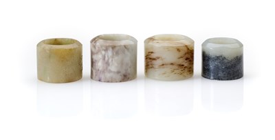 Lot 87 - THREE CHINESE JADE ARCHERS RINGS, QING DYNASTY, 19TH CENTURY