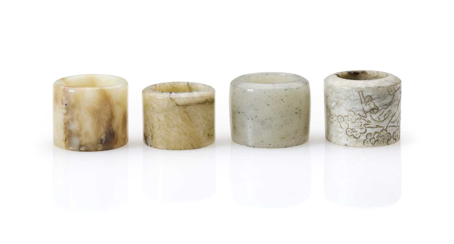 Lot 86 - FOUR CHINESE JADE ARCHERS RINGS, QING DYNASTY,