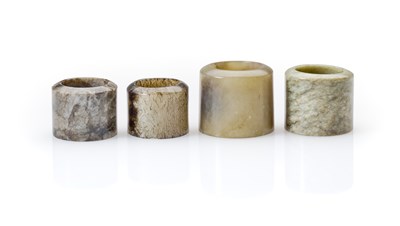 Lot 85 - FOUR CHINESE JADE ARCHERS RINGS, QING DYNASTY, 19TH CENTURY