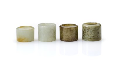 Lot 83 - FOUR CHINESE JADE ARCHERS RINGS, QING DYNASTY, 19TH CENTURY