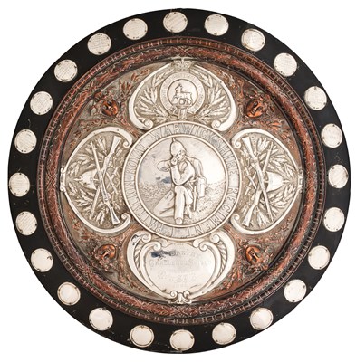 Lot 630 - A LARGE CIRCULAR SILVER-MOUNTED MUSKETRY CHALLENGE SHIELD OF THE 1ST BATTALION WARWICKSHIRE
