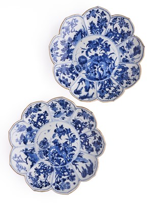 Lot 1 - A PAIR OF CHINESE LOBED BLUE AND WHITE DISHES, QING DYNASTY, KANGXI PERIOD (1662-1722)