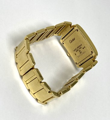 Lot 324 - CARTIER, TANK FRANCAISE, REF.1821: GOLD MID SIZE BRACELET WATCH, SWISS, CIRCA 2000