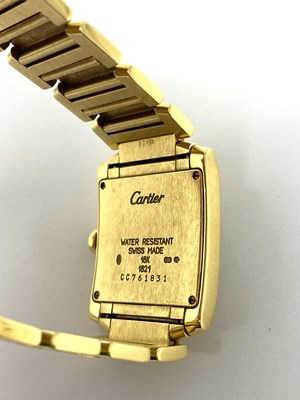 Lot 324 - CARTIER, TANK FRANCAISE, REF.1821: GOLD MID SIZE BRACELET WATCH, SWISS, CIRCA 2000