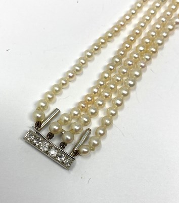 Lot 445 - PICKSLAY & CO: BELLE EPOQUE SEED PEARL AND DIAMOND BRACELET, 1900s