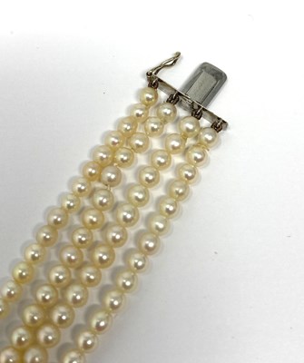 Lot 445 - PICKSLAY & CO: BELLE EPOQUE SEED PEARL AND DIAMOND BRACELET, 1900s