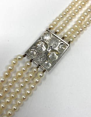 Lot 445 - PICKSLAY & CO: BELLE EPOQUE SEED PEARL AND DIAMOND BRACELET, 1900s