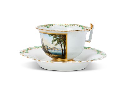 Lot 36 - A MEISSEN PORCELAIN TOPOGRAPHICAL TEACUP AND SAUCER, MID 19TH CENTURY