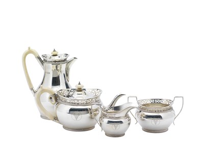 Lot 102 - A GEORGE V FOUR-PIECE SILVER TEA SET