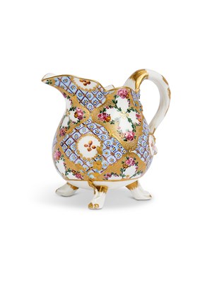 Lot 44 - A SEVRES PORCELAIN MILK JUG (POT À LAIT À TROIS PIEDS), CIRCA 1768
