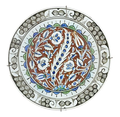 Lot 125 - AN IZNIK DISH, OTTOMAN ANATOLIA, 1580-1590