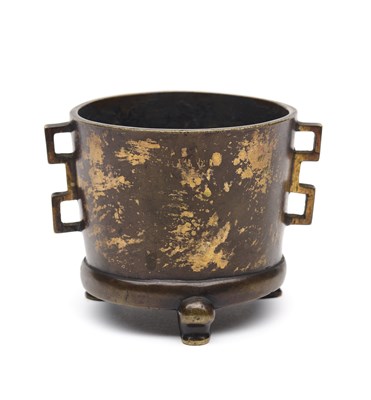 Lot 22 - A CHINESE GOLD-SPLASHED BRONZE TRIPOD CENSER, 17TH CENTURY
