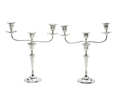 Lot 106 - A PAIR OF GEORGE III SHEFFIELD PLATE THREE-LIGHT CANDELABRA