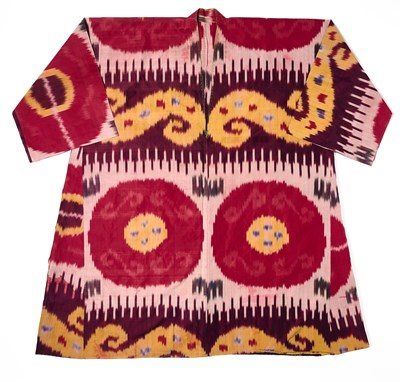 Lot 179 - A SILK IKAT COAT (KHALAT), BUKHARA, CIRCA 1900