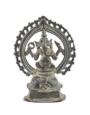 Lot 138 - A BRONZE FIGURE OF GANESHA, KERALA, SOUTH-WESTERN INDIA, CIRCA 16TH CENTURY