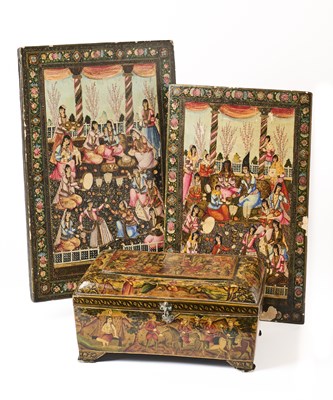 Lot 26 - A LACQUERED PAPIER-MACHE HINGED CASKET AND MIRROR CASE, PERSIA, 19TH CENTURY