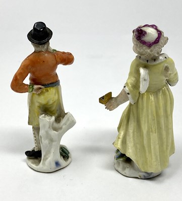 Lot 18 - TWO MEISSEN PORCELAIN FIGURES, CUPID IN DISGUISE AND A MAN SMOKING A PIPE, 18TH CENTURY