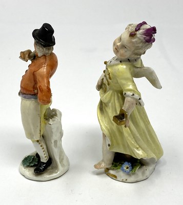 Lot 18 - TWO MEISSEN PORCELAIN FIGURES, CUPID IN DISGUISE AND A MAN SMOKING A PIPE, 18TH CENTURY