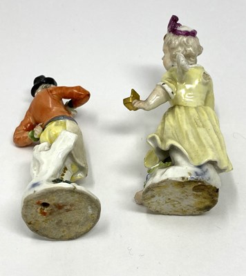 Lot 18 - TWO MEISSEN PORCELAIN FIGURES, CUPID IN DISGUISE AND A MAN SMOKING A PIPE, 18TH CENTURY