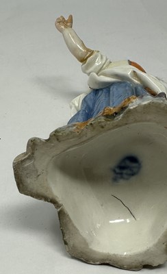 Lot 18 - TWO MEISSEN PORCELAIN FIGURES, CUPID IN DISGUISE AND A MAN SMOKING A PIPE, 18TH CENTURY