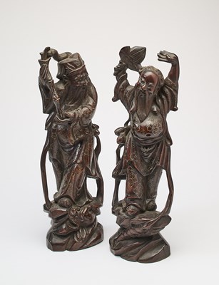 Lot 63 - A PAIR OF CHINESE SILVER-WIRE INLAID WOOD IMMORTALS, 20TH CENTURY