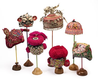 Lot 171 - A GROUP OF SEVEN CHINESE AND SOUTH-EAST ASIAN HATS, 20TH CENTURY