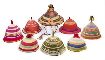Lot 172 - A COLLECTION OF EIGHT AFRICAN HATS, 20TH CENTURY