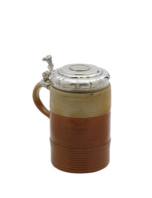 Lot 125 - A SILVER-MOUNTED STONEWARE TANKARD