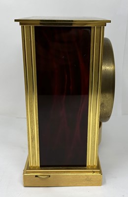 Lot 44 - JAEGER LECOULTRE, ATMOS VII 'EMBASSY': A SWISS GILT AND RED LACQUERED BRASS CLOCK, CIRCA 1978