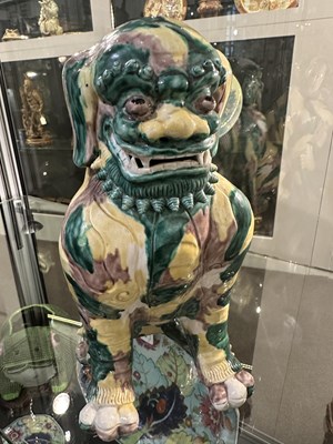 Lot 82 - A PAIR OF CHINESE FAMILLE-VERTE BUDDHIST LIONS, LATE QING DYNASTY, 19TH/20TH CENTURY
