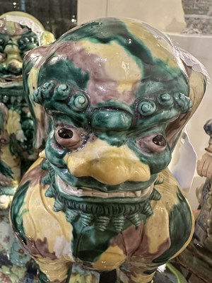 Lot 82 - A PAIR OF CHINESE FAMILLE-VERTE BUDDHIST LIONS, LATE QING DYNASTY, 19TH/20TH CENTURY