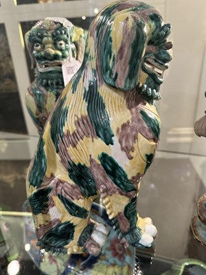 Lot 82 - A PAIR OF CHINESE FAMILLE-VERTE BUDDHIST LIONS, LATE QING DYNASTY, 19TH/20TH CENTURY