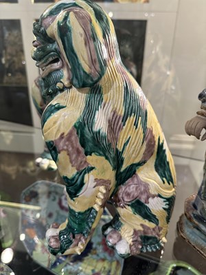 Lot 82 - A PAIR OF CHINESE FAMILLE-VERTE BUDDHIST LIONS, LATE QING DYNASTY, 19TH/20TH CENTURY