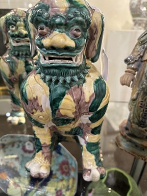 Lot 82 - A PAIR OF CHINESE FAMILLE-VERTE BUDDHIST LIONS, LATE QING DYNASTY, 19TH/20TH CENTURY