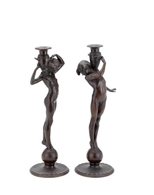 Lot 12 - A PAIR OF FIGURAL CANDLESTICKS