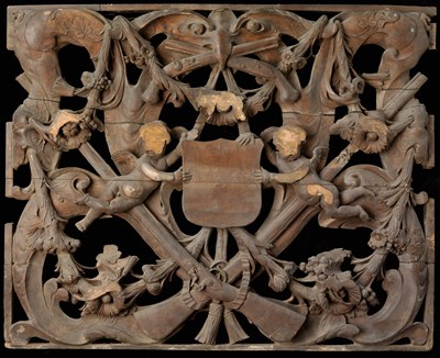 Lot 16 - A CARVED LIMEWOOD PANEL